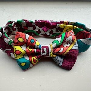 Hermes silk bow tie can be worn around neck or wrist